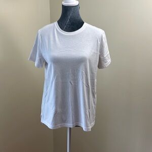 white xersion top in a med